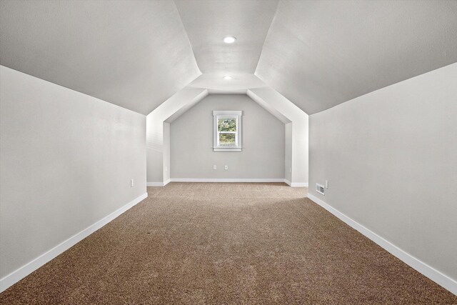 40083 Lake Terrace Ct, Loon Lake, WA 99148 - additional living space with lofted ceiling, carpet floors, baseboards, and recessed lighting