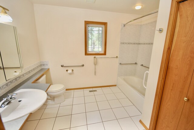 3704 E Pineland Rd, Colbert, WA 99005 - full bath with a sink, bathing tub / shower combination, toilet, tile patterned flooring, and baseboards