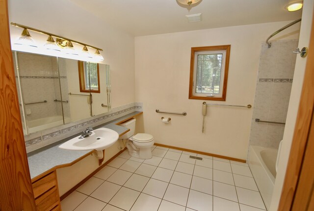 3704 E Pineland Rd, Colbert, WA 99005 - full bathroom with plenty of natural light, toilet,  shower combination, and tile patterned flooring