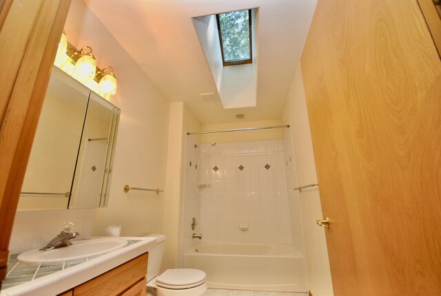 3704 E Pineland Rd, Colbert, WA 99005 - bathroom with a skylight, toilet, vanity, bathing tub / shower combination, and tasteful backsplash