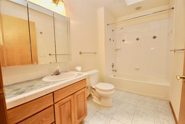 3704 E Pineland Rd, Colbert, WA 99005 - full bathroom with toilet, vanity, tile patterned flooring, and washtub / shower combination
