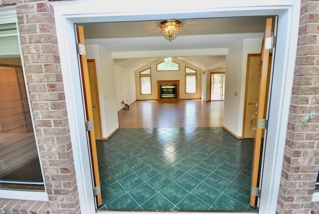 3704 E Pineland Rd, Colbert, WA 99005 - hall featuring baseboards, dark tile patterned floors, and lofted ceiling