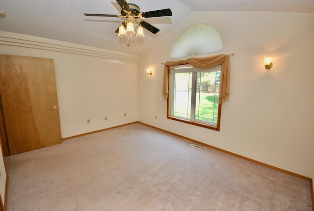 3704 E Pineland Rd, Colbert, WA 99005 - empty room featuring light carpet, vaulted ceiling, a ceiling fan, and baseboards