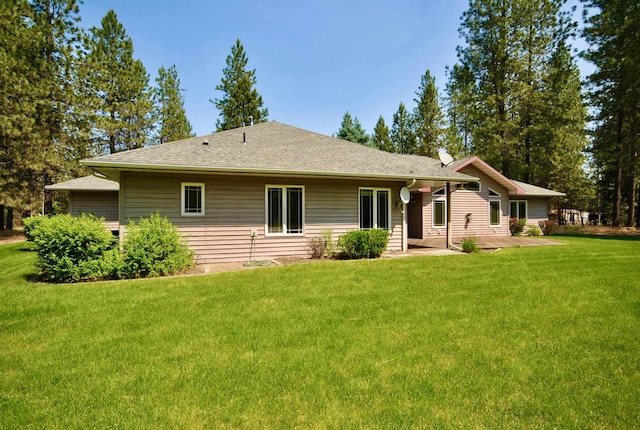 3704 E Pineland Rd, Colbert, WA 99005 - back of house featuring a lawn, a patio, and a shingled roof