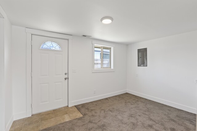 13812 E Rockwell Ave, Spokane, WA 99216 - carpeted foyer with electric panel, baseboards, and plenty of natural light