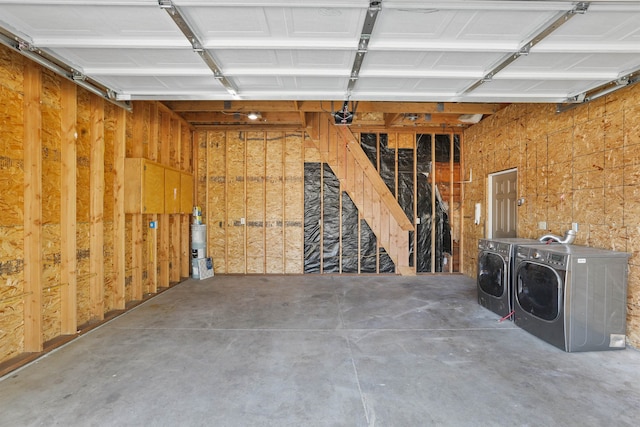 13812 E Rockwell Ave, Spokane, WA 99216 - garage featuring independent washer and dryer and a garage door opener