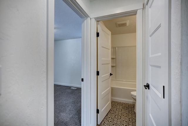 5320 N Ash St, Spokane, WA 99205 - bathroom featuring a tub to relax in, toilet, a shower, and baseboards