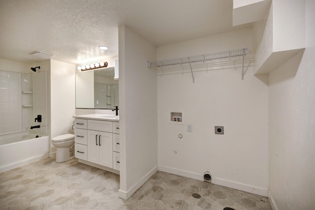 5320 N Ash St, Spokane, WA 99205 - washroom featuring hookup for an electric dryer, hookup for a washing machine, gas dryer hookup, baseboards, and a textured ceiling
