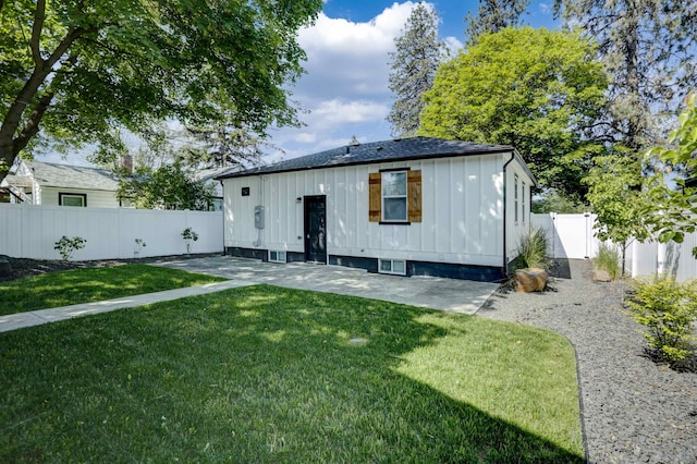 5320 N Ash St, Spokane, WA 99205 - back of property with board and batten siding and a patio