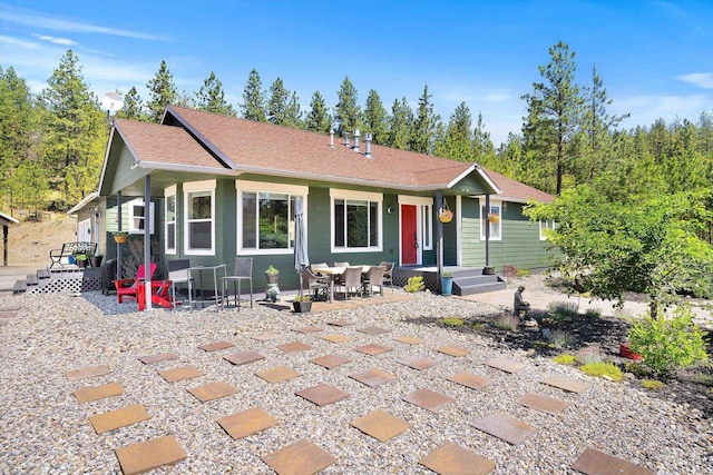 5814 Jergens Rd Unit B, Nine Mile Falls, WA 99026 - ranch-style home featuring a patio area and roof with shingles