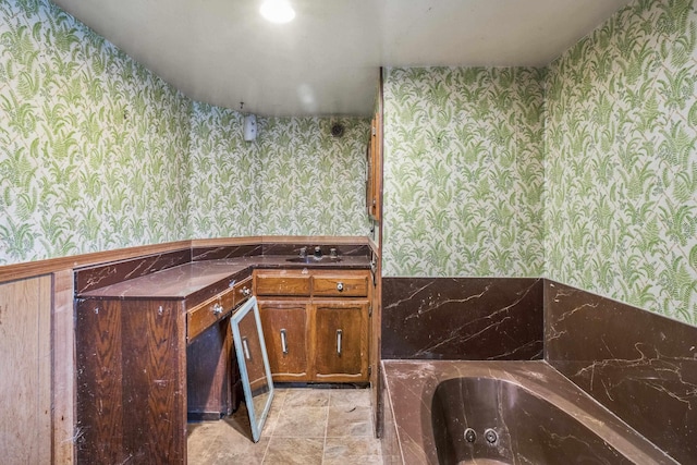 3707 E Olympic Ave, Spokane, WA 99217 - full bath featuring wallpapered walls, a jetted tub, and vanity