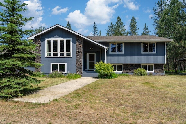 4615 E Russell Rd, Colbert, WA 99005 - bi-level home with a front lawn and stone siding