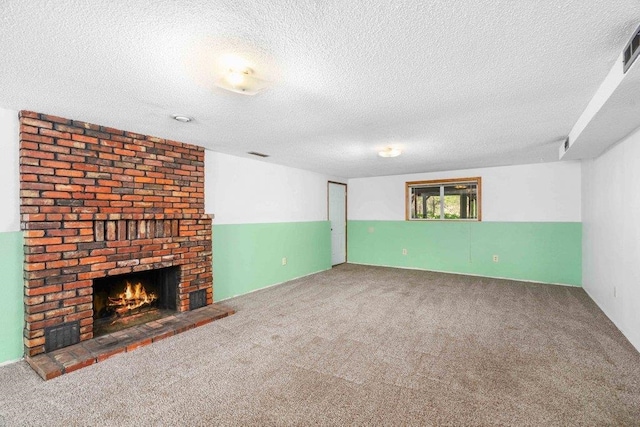 4615 E Russell Rd, Colbert, WA 99005 - unfurnished living room with a textured ceiling, carpet floors, and a fireplace