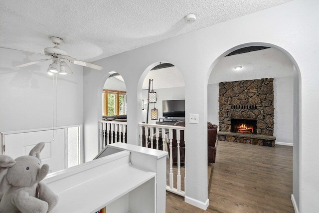 4615 E Russell Rd, Colbert, WA 99005 - hallway featuring wood finished floors and a textured ceiling