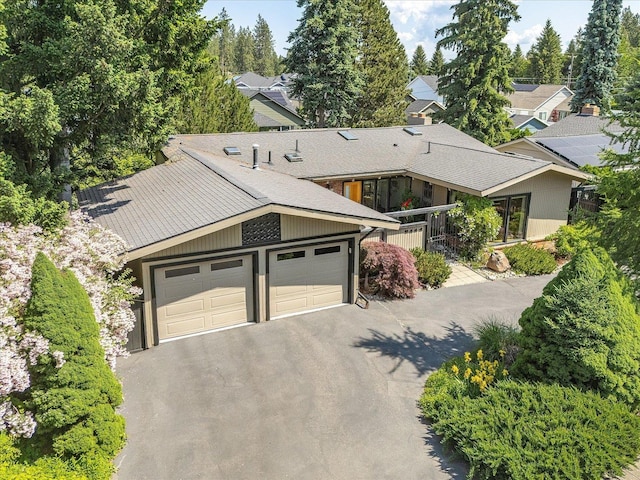 2111 E 34th Ave, Spokane, WA 99203 - view of front of property with driveway and an attached garage