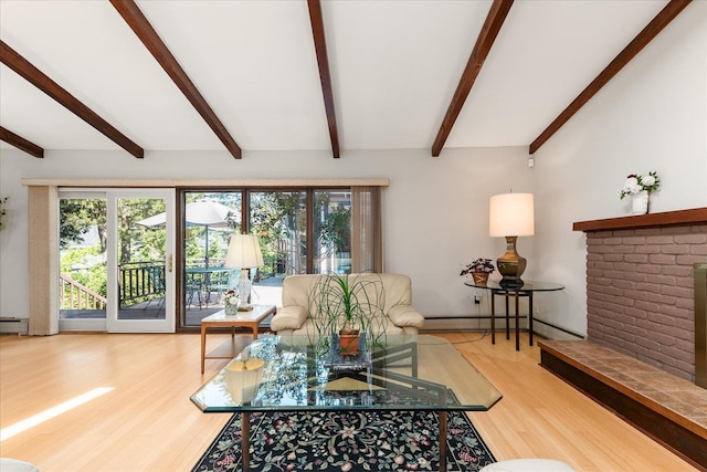 2111 E 34th Ave, Spokane, WA 99203 - living room with beam ceiling, wood finished floors, healthy amount of natural light, and a brick fireplace
