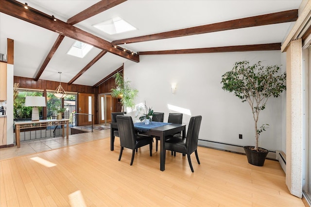 2111 E 34th Ave, Spokane, WA 99203 - dining area with a skylight and light wood-style floors