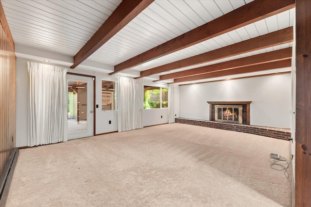 2111 E 34th Ave, Spokane, WA 99203 - unfurnished living room featuring baseboard heating, carpet, a fireplace, and wood ceiling with exposed beams