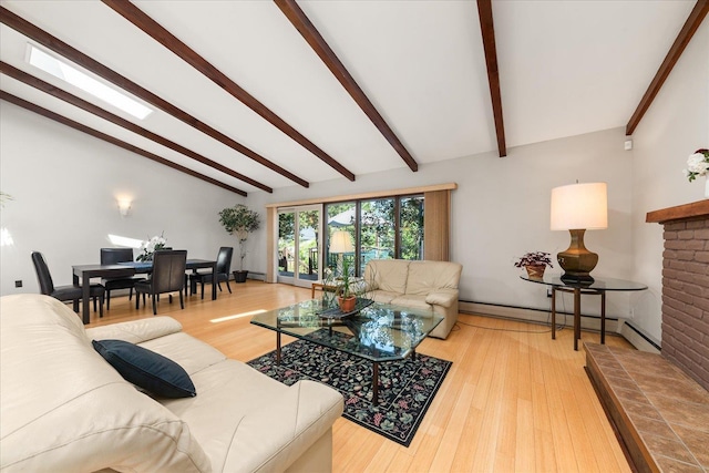 2111 E 34th Ave, Spokane, WA 99203 - living area with wood finished floors, a fireplace, a baseboard heating unit, and baseboard heating
