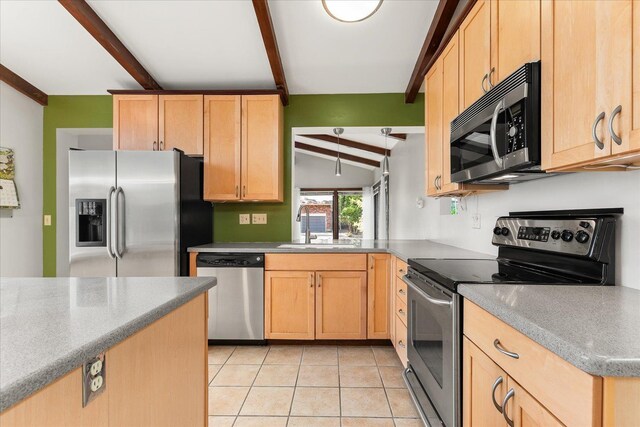 2111 E 34th Ave, Spokane, WA 99203 - kitchen with appliances with stainless steel finishes, light brown cabinets, a sink, and light tile patterned flooring