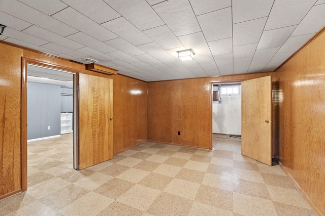 12117 E Boone Ave, Spokane Valley, WA 99206 - unfurnished room with wood walls and light flooring