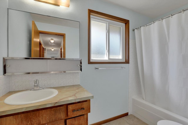 11619 N Roundup Rd, Mead, WA 99021 - full bathroom featuring backsplash, vanity, shower / bathtub combination with curtain, and tile patterned flooring