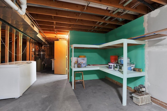11619 N Roundup Rd, Mead, WA 99021 - unfinished below grade area with water heater and fridge