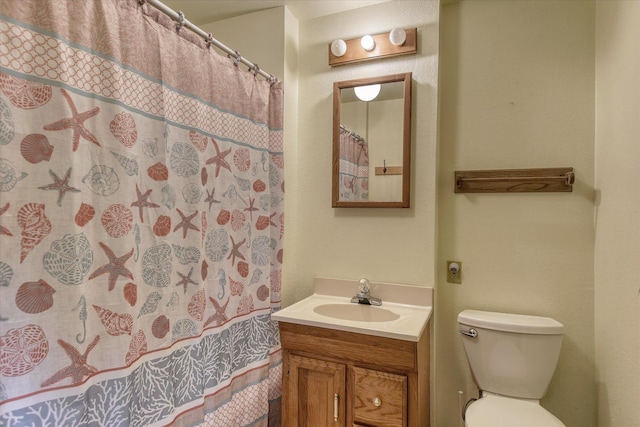 1815 E 64th Ave, Spokane, WA 99223 - full bath featuring vanity, toilet, and a shower with curtain