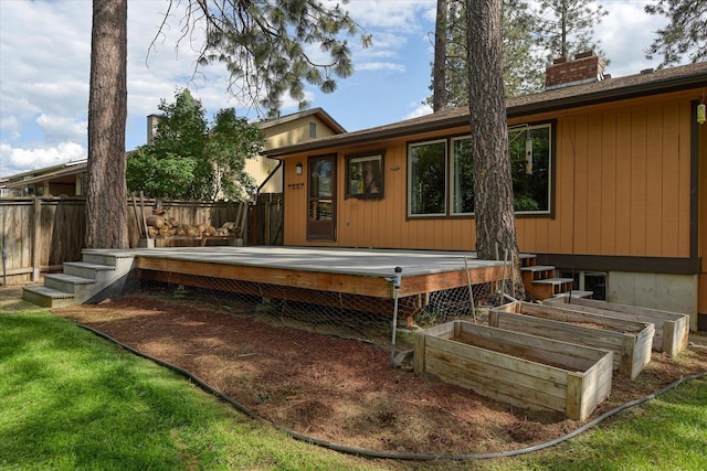 1815 E 64th Ave, Spokane, WA 99223 - back of house featuring a deck and a chimney