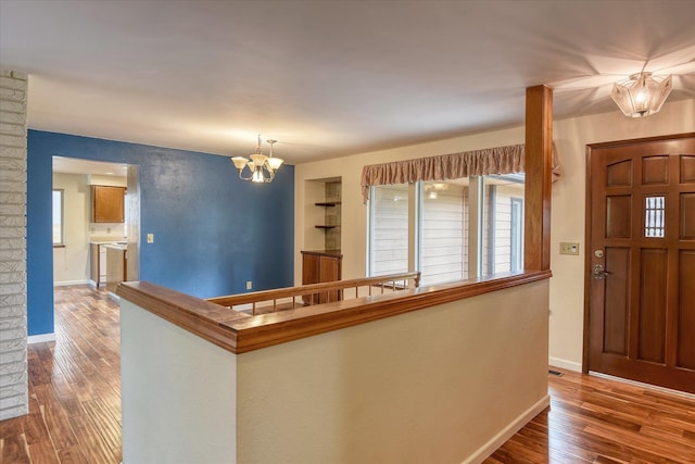 1815 E 64th Ave, Spokane, WA 99223 - entryway with a chandelier, hardwood / wood-style floors, plenty of natural light, and baseboards