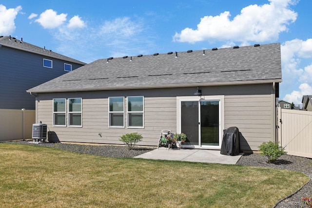 8113 S Safflower St, Cheney, WA 99004 - back of property featuring a patio, central air condition unit, and roof with shingles