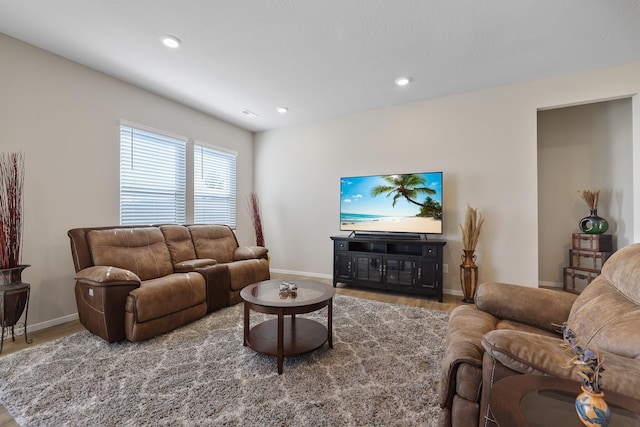 8113 S Safflower St, Cheney, WA 99004 - living area featuring wood finished floors, baseboards, and recessed lighting