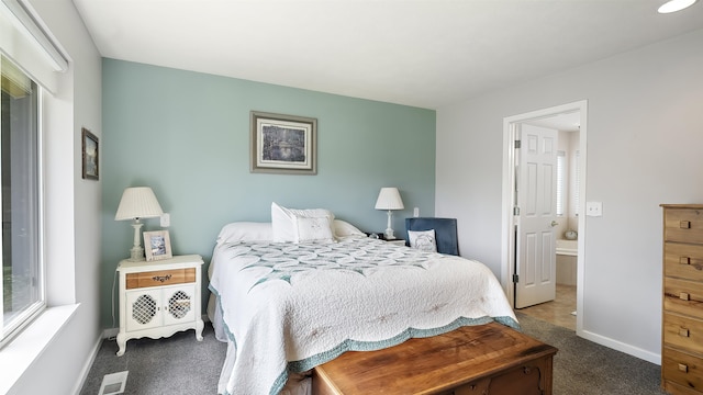 36918 N Valley Rd, Chattaroy, WA 99003 - carpeted bedroom featuring baseboards and ensuite bath