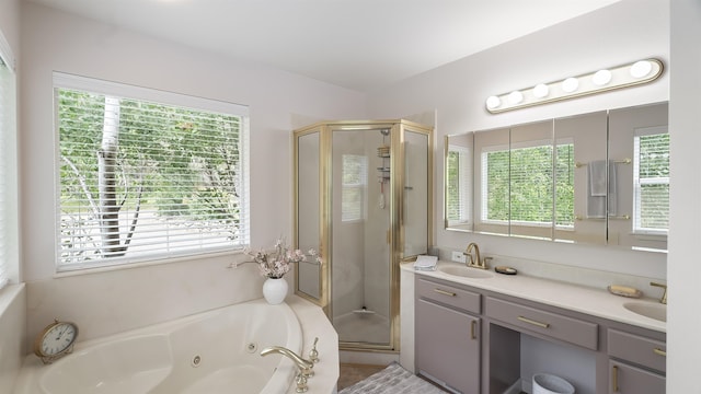 36918 N Valley Rd, Chattaroy, WA 99003 - bathroom featuring a shower stall, a tub with jets, and double vanity