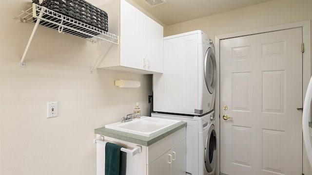 36918 N Valley Rd, Chattaroy, WA 99003 - laundry room with estacked washer and dryer and cabinet space