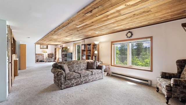 36918 N Valley Rd, Chattaroy, WA 99003 - living area with a baseboard radiator, carpet floors, and a fireplace