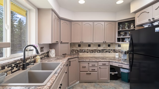 36918 N Valley Rd, Chattaroy, WA 99003 - kitchen with freestanding refrigerator, a sink, decorative backsplash, open shelves, and gray cabinetry
