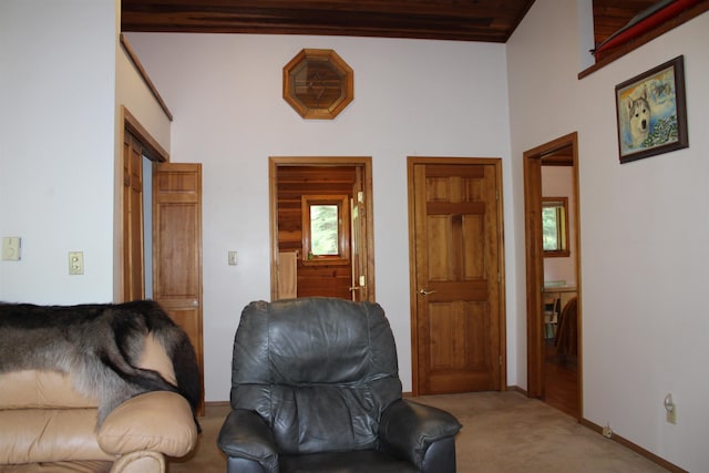 42604 Hatch Rd, Deer Park, WA 99006 - living area with carpet floors, baseboards, and beamed ceiling