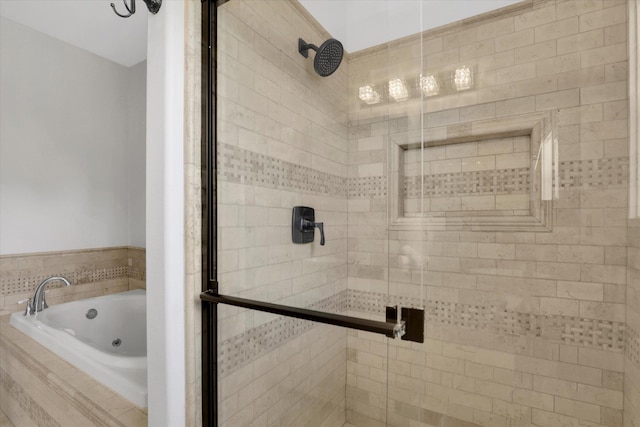 2306 W Rainier Ct, Spokane, WA 99208 - bathroom featuring a stall shower and a jetted tub