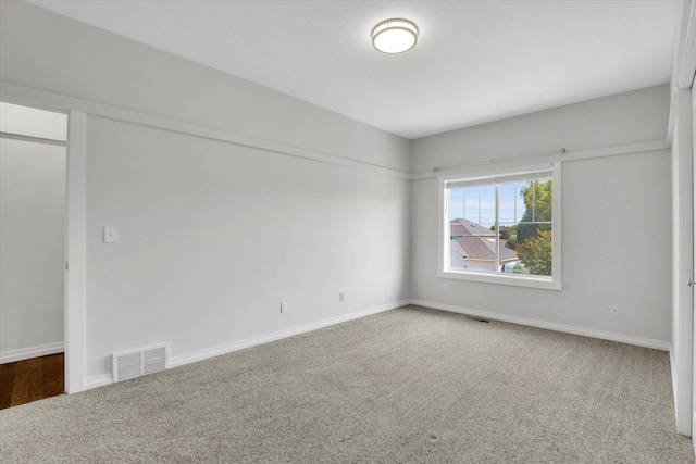 2306 W Rainier Ct, Spokane, WA 99208 - carpeted empty room with baseboards