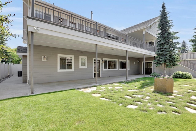 2306 W Rainier Ct, Spokane, WA 99208 - back of property with a patio and a balcony