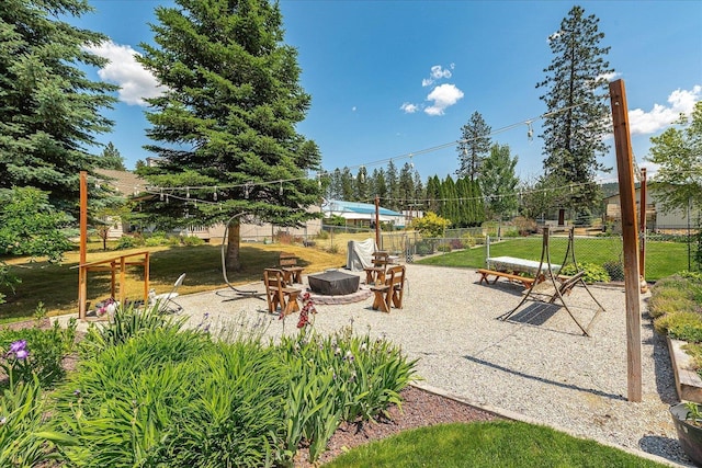 16324 N Cimmeron Ct, Nine Mile Falls, WA 99026 - view of patio with an outdoor fire pit
