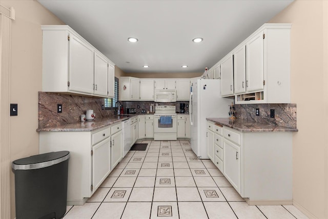 16324 N Cimmeron Ct, Nine Mile Falls, WA 99026 - kitchen with white appliances, tasteful backsplash, white cabinetry, and recessed lighting