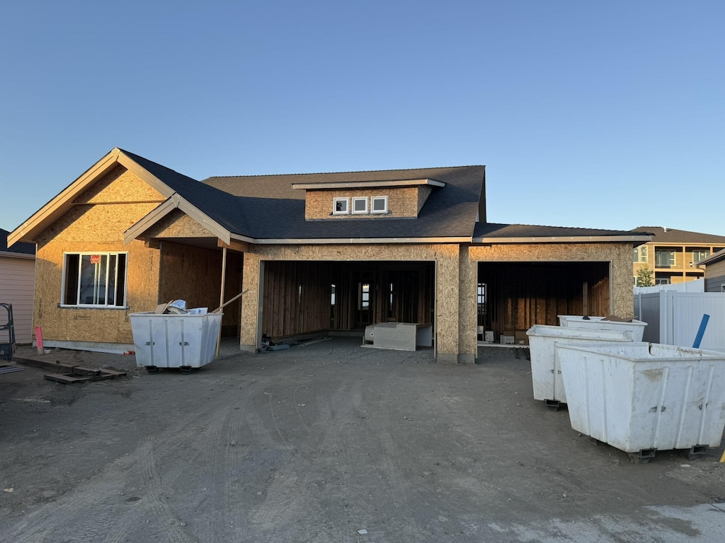 1503 S Aspen Ct, Spokane Valley, WA 99016 - property in mid-construction featuring a garage, a shingled roof, and driveway