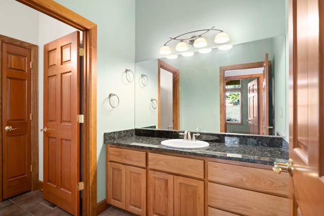 8518 E Black Oak Ln, Spokane, WA 99217 - bathroom with vanity and tile patterned floors