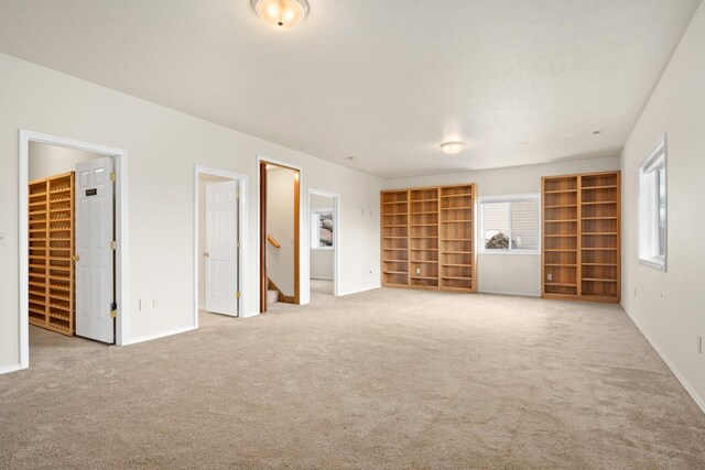 8518 E Black Oak Ln, Spokane, WA 99217 - unfurnished living room with healthy amount of natural light, carpet floors, and baseboards