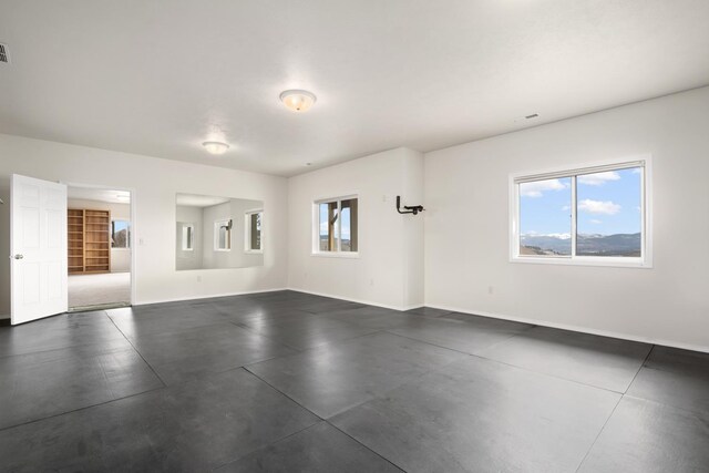 8518 E Black Oak Ln, Spokane, WA 99217 - spare room featuring baseboards