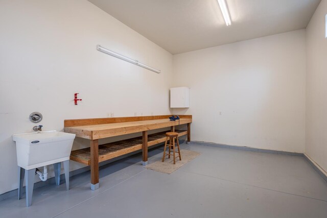 8518 E Black Oak Ln, Spokane, WA 99217 - misc room featuring a workshop area and concrete floors