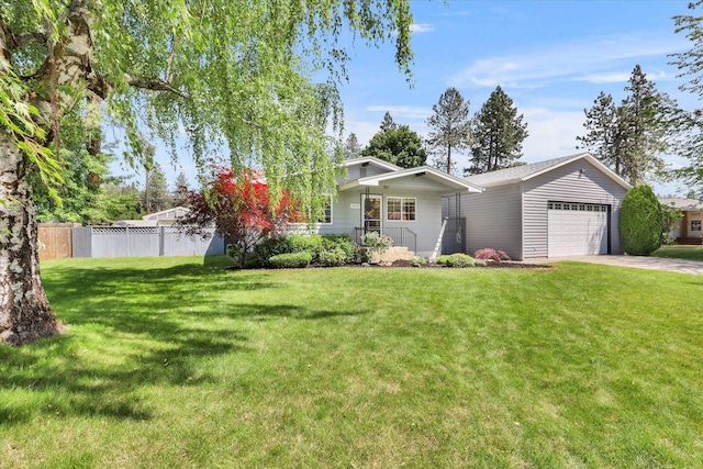 1010 W Westmont Way, Spokane, WA 99208 - view of front facade with a garage and concrete driveway