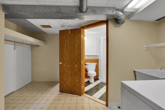 1010 W Westmont Way, Spokane, WA 99208 - laundry room featuring a sink and light floors